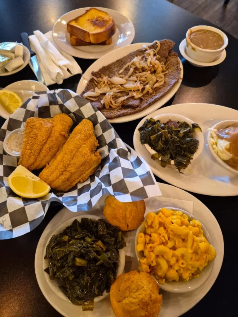 Fried catfish and soul food spread at Daley's Restaurant, oldest restaurant in Chicago, Woodlawn