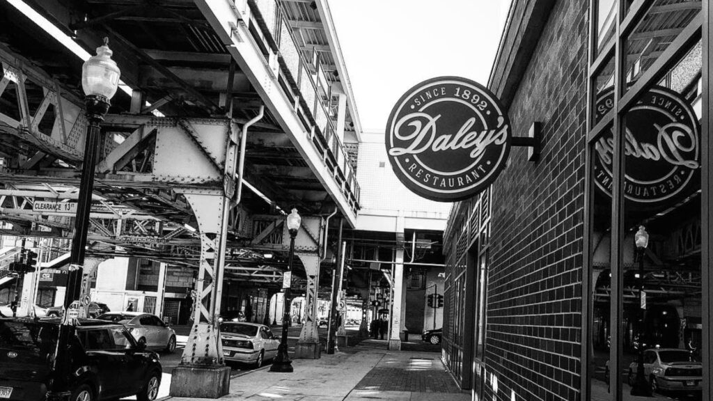 Daley's Restaurant sign under Green Line tracks, oldest restaurant in Chicago, Woodlawn